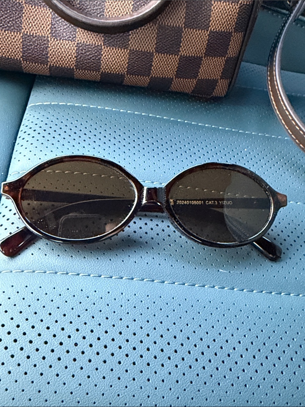 Eve Oval Tortoiseshell Sunglasses with Dark Lenses